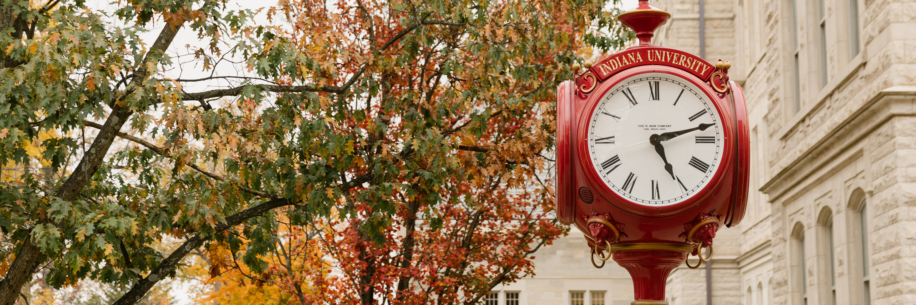 Red Indiana University street post clock