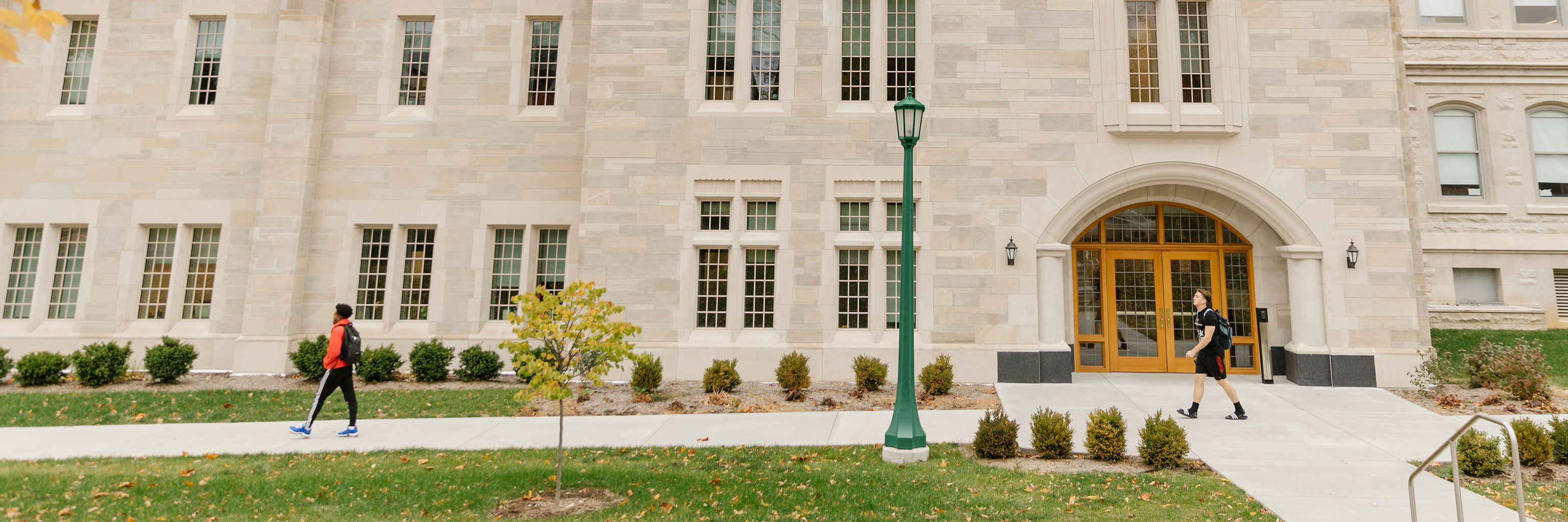 Students walk in front of Swain Hall on the Indiana University Bloomington campus.